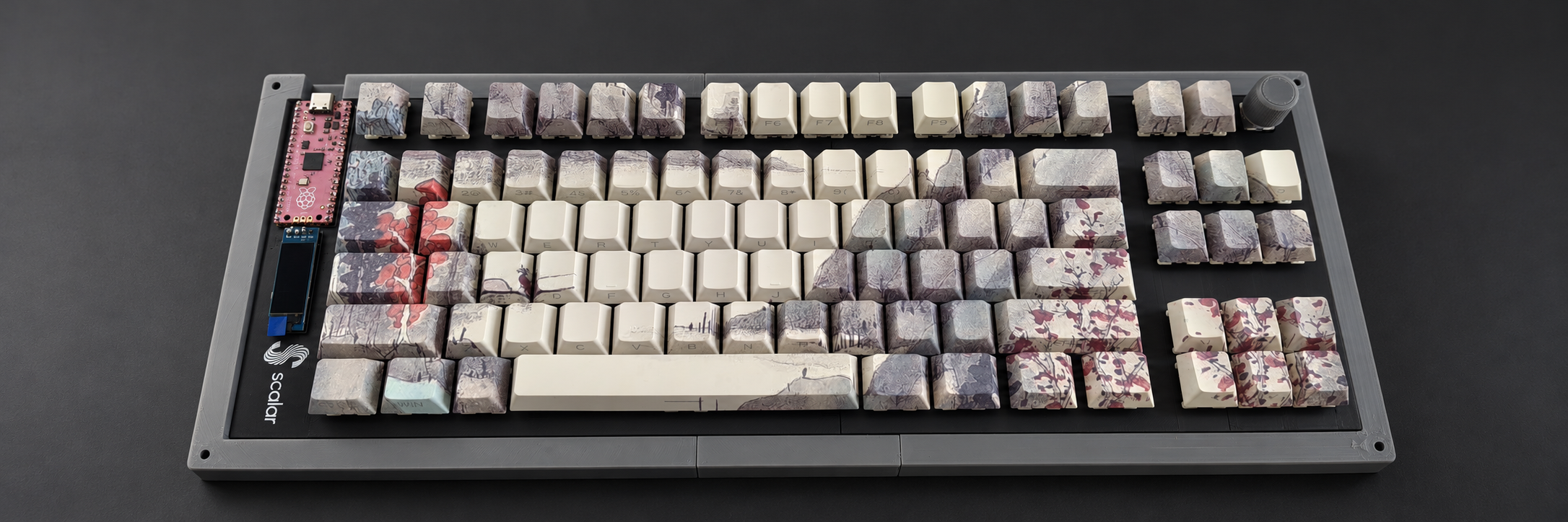 KB-01 keyboard photographed on a charcoal surface; AI-staged background